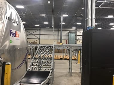A roller conveyor from a Fed Ex facility for which Precision Warehouse Design is an Authorized Integrator